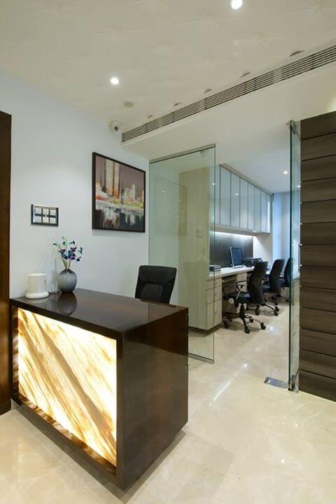 Sleek and functional office space design from VJProfessional Interior Design